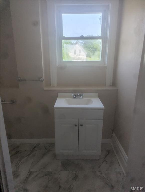 4737 Beacon Ave, Saint Louis, MO 63120 - bathroom featuring marble finish floors and vanity