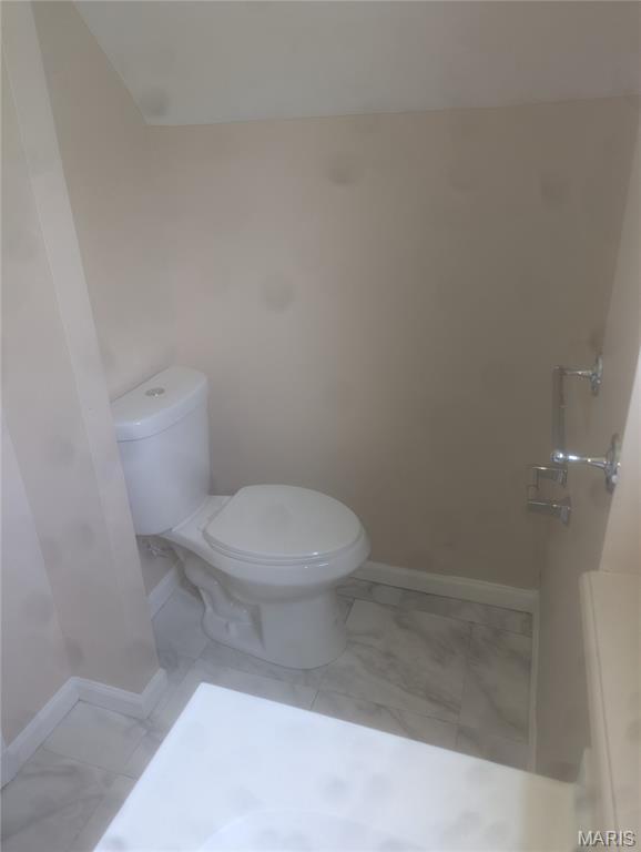 4737 Beacon Ave, Saint Louis, MO 63120 - bathroom with marble finish floors