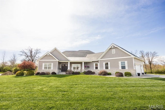 1821 Orr Ln, Ofallon, IL 62269 - view of front of property featuring stone siding, a front lawn, a garage, and driveway