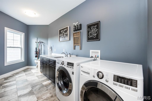 1821 Orr Ln, Ofallon, IL 62269 - laundry room with washing machine and clothes dryer, cabinet space, and baseboards