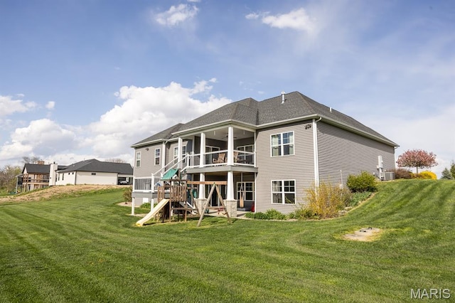 1821 Orr Ln, Ofallon, IL 62269 - rear view of property with a lawn, stairs, and a balcony