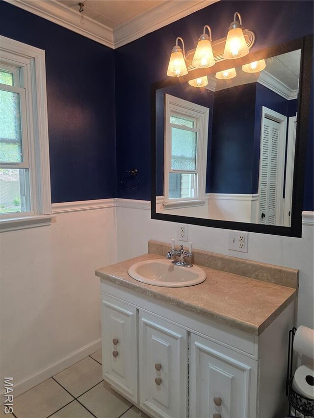 18835 Mary Jane Ln, Carlyle, IL 62231 - bathroom with ornamental molding, vanity, tile patterned flooring, and healthy amount of natural light