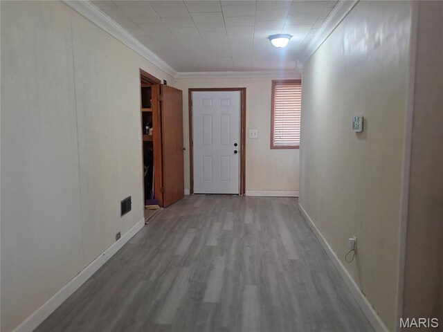 18835 Mary Jane Ln, Carlyle, IL 62231 - hallway with crown molding, wood finished floors, and baseboards