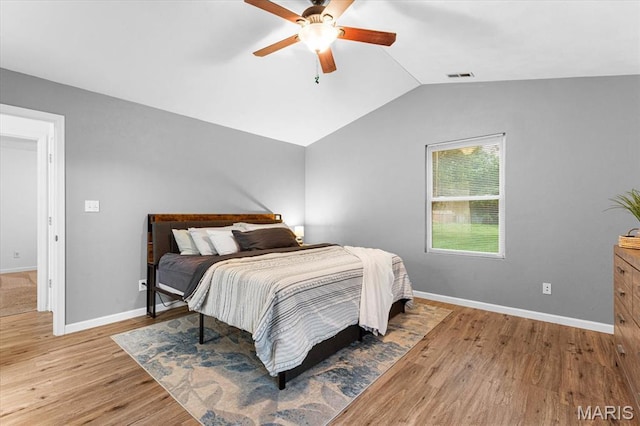 9138 Lynwood Ln, Fairview Heights, IL 62208 - bedroom featuring vaulted ceiling, light wood-style floors, baseboards, and a ceiling fan