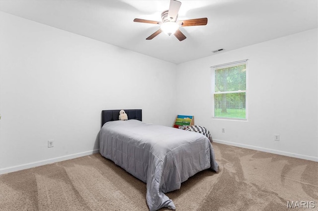 9138 Lynwood Ln, Fairview Heights, IL 62208 - carpeted bedroom with baseboards and a ceiling fan