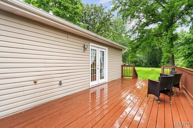 9138 Lynwood Ln, Fairview Heights, IL 62208 - wooden deck featuring french doors and view of wooded area