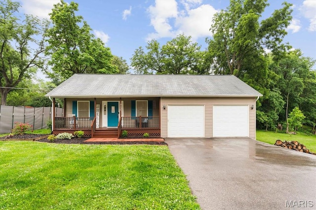9138 Lynwood Ln, Fairview Heights, IL 62208 - single story home with a porch, a garage, and asphalt driveway