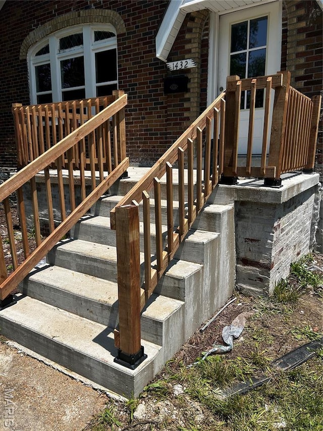1432 Tamerton Ave, Overland, MO 63132 - property entrance featuring brick siding