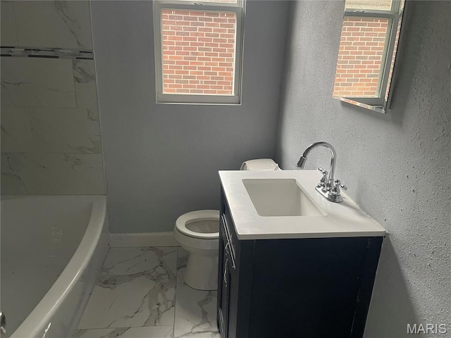 1432 Tamerton Ave, Overland, MO 63132 - bathroom featuring marble look tile flooring and vanity