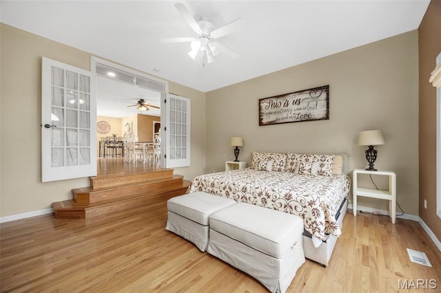 795 Schluersburg Rd, Augusta, MO 63332 - bedroom featuring wood finished floors, baseboards, and ceiling fan