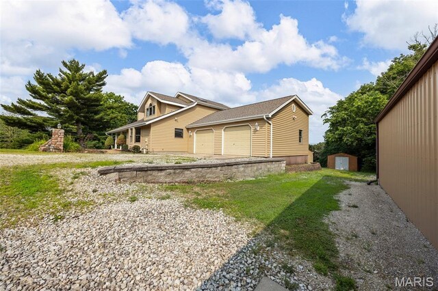 795 Schluersburg Rd, Augusta, MO 63332 - view of side of property featuring a garage and driveway