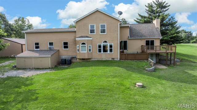 795 Schluersburg Rd, Augusta, MO 63332 - rear view of house with a deck, a yard, a chimney, crawl space, and cooling unit