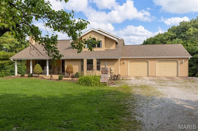 795 Schluersburg Rd, Augusta, MO 63332 - view of front of property with gravel driveway, an attached garage, a front yard, and roof with shingles