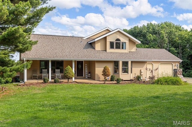 795 Schluersburg Rd, Augusta, MO 63332 - view of front facade with a garage, roof with shingles, and a front yard