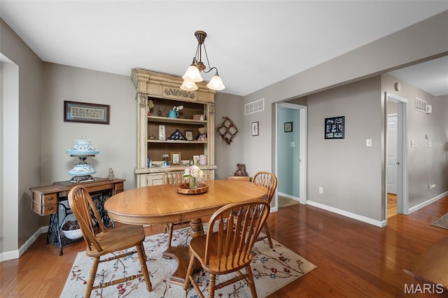 206 Belmonte Cir, Ofallon, MO 63368 - dining room with light wood finished floors and baseboards