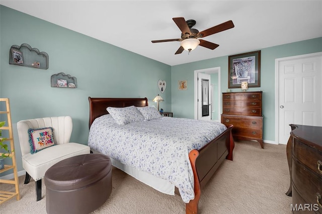 206 Belmonte Cir, Ofallon, MO 63368 - bedroom with light carpet, a ceiling fan, and baseboards