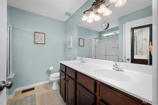 206 Belmonte Cir, Ofallon, MO 63368 - full bath with baseboards, a shower stall, toilet, double vanity, and a chandelier