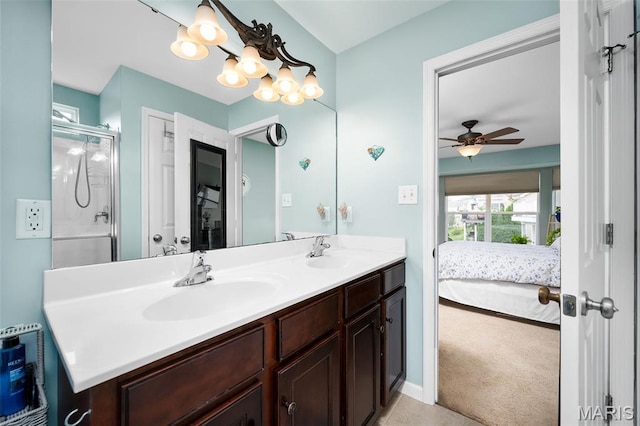 206 Belmonte Cir, Ofallon, MO 63368 - full bath featuring connected bathroom, double vanity, a ceiling fan, and a shower with door