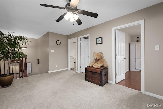 206 Belmonte Cir, Ofallon, MO 63368 - spare room featuring carpet, a ceiling fan, and baseboards