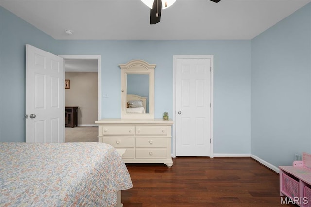 206 Belmonte Cir, Ofallon, MO 63368 - bedroom featuring baseboards, dark wood finished floors, and a ceiling fan