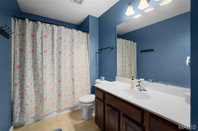 206 Belmonte Cir, Ofallon, MO 63368 - bathroom with vanity, toilet, tile patterned flooring, and a shower with shower curtain