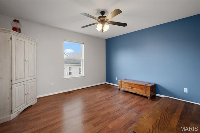 206 Belmonte Cir, Ofallon, MO 63368 - unfurnished bedroom with wood finished floors, baseboards, and ceiling fan