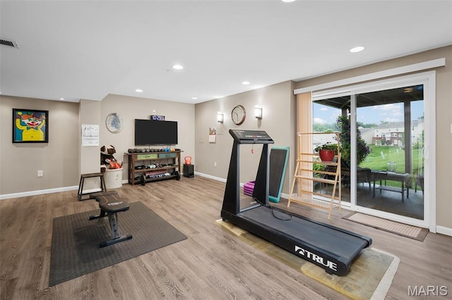 206 Belmonte Cir, Ofallon, MO 63368 - workout area featuring baseboards, wood finished floors, and recessed lighting