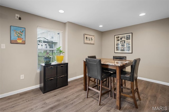206 Belmonte Cir, Ofallon, MO 63368 - dining space with wood finished floors, recessed lighting, and baseboards