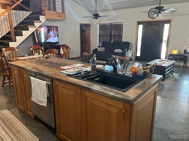 10570 Old 8 E, Mineral Point, MO 63660 - kitchen featuring ceiling fan, open floor plan, a sink, concrete floors, and lofted ceiling