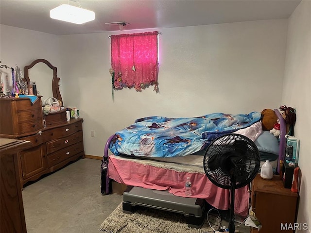 10570 Old 8 E, Mineral Point, MO 63660 - bedroom with finished concrete floors and baseboards