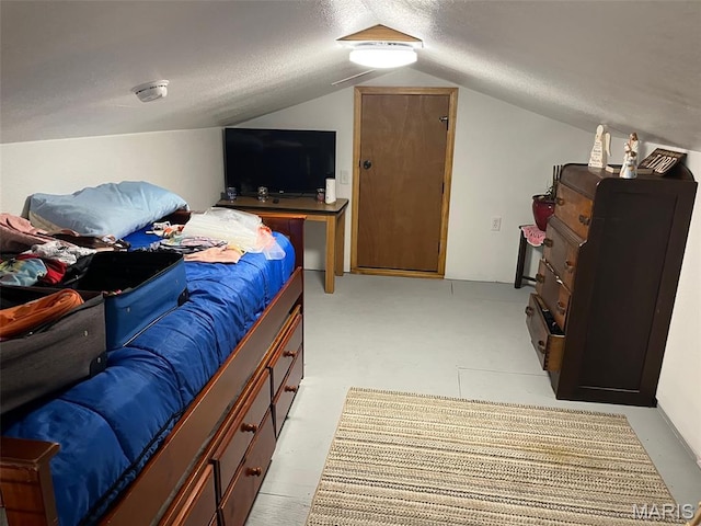 10570 Old 8 E, Mineral Point, MO 63660 - bedroom featuring vaulted ceiling and a textured ceiling