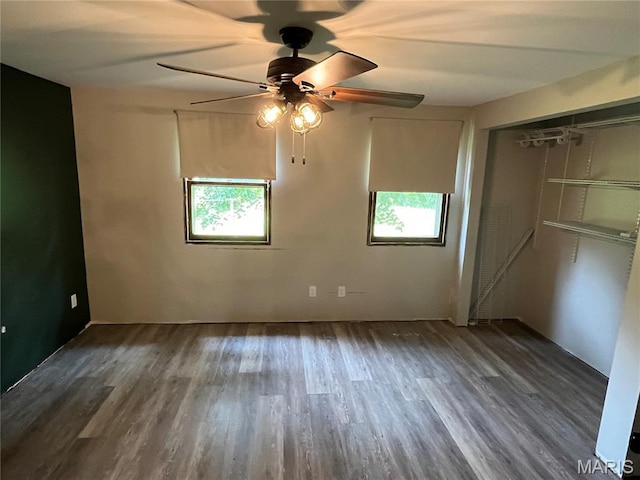 42 Davis Rd, Troy, MO 63379 - unfurnished bedroom featuring wood finished floors, a closet, and ceiling fan