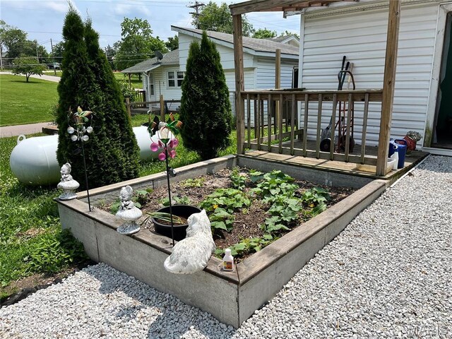 1003 W Ellis St, Salem, MO 65560 - view of yard featuring a vegetable garden and a wooden deck