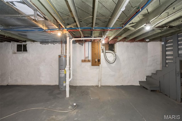 3271 Alfred Ave, Saint Louis, MO 63116 - unfinished below grade area with electric water heater and stairs