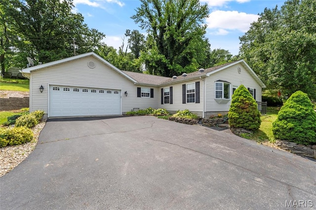 2418 Old State Route 3, East Carondelet, IL 62240 - view of front of house featuring asphalt driveway and an attached garage