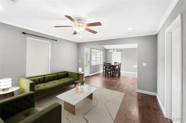 2418 Old State Route 3, East Carondelet, IL 62240 - living area with dark wood finished floors, ceiling fan, ornamental molding, and recessed lighting