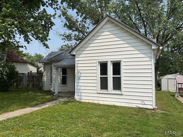410 S Main St, Monroe City, MO 63456 - back of property featuring a shed