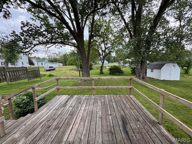 410 S Main St, Monroe City, MO 63456 - deck with a storage unit and a yard