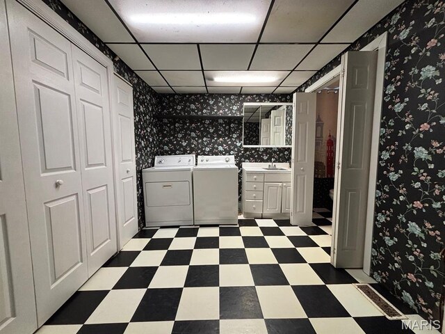 410 S Main St, Monroe City, MO 63456 - laundry area with tile patterned floors, independent washer and dryer, and wallpapered walls