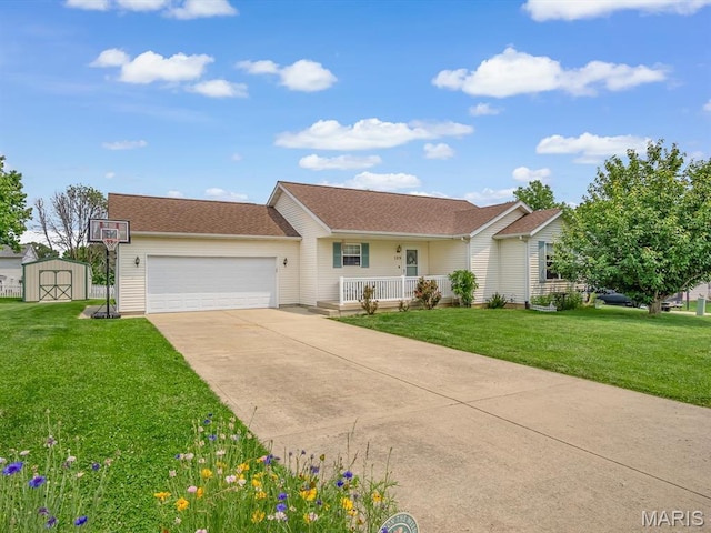 109 E Red Bud Ct, Valmeyer, IL 62295 - ranch-style home featuring covered porch, a shed, an attached garage, a front lawn, and driveway