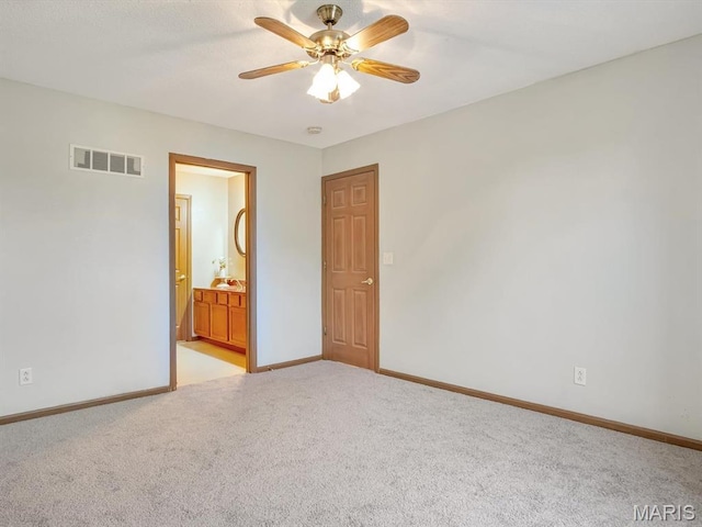 109 E Red Bud Ct, Valmeyer, IL 62295 - spare room featuring light colored carpet and ceiling fan