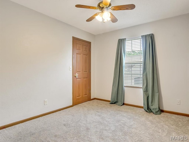 109 E Red Bud Ct, Valmeyer, IL 62295 - carpeted empty room featuring ceiling fan and baseboards