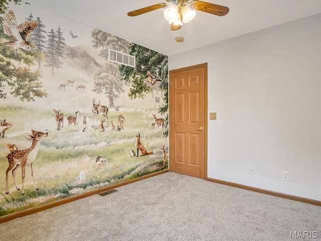 109 E Red Bud Ct, Valmeyer, IL 62295 - carpeted empty room with a ceiling fan, a smoke detector, and wallpapered walls