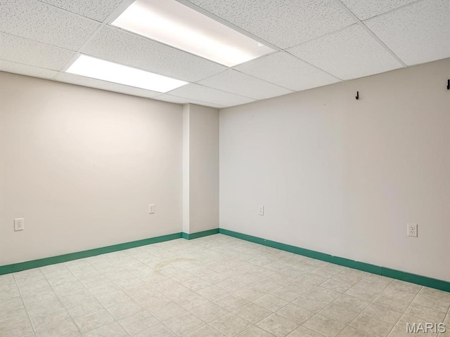 109 E Red Bud Ct, Valmeyer, IL 62295 - spare room featuring a paneled ceiling and baseboards