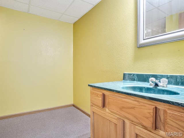 109 E Red Bud Ct, Valmeyer, IL 62295 - bathroom featuring a paneled ceiling and vanity