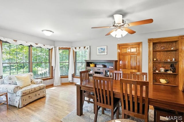 18232 Prickly Pear Ct, Pacific, MO 63069 - dining space featuring ceiling fan and wood finished floors