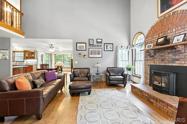18232 Prickly Pear Ct, Pacific, MO 63069 - living area featuring a high ceiling, wood finished floors, and a ceiling fan