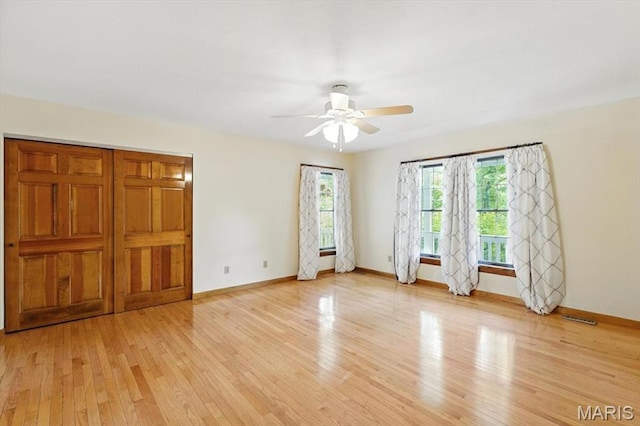 18232 Prickly Pear Ct, Pacific, MO 63069 - unfurnished bedroom with light wood-style flooring and a ceiling fan