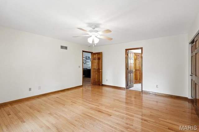 18232 Prickly Pear Ct, Pacific, MO 63069 - empty room featuring ceiling fan and light wood-type flooring