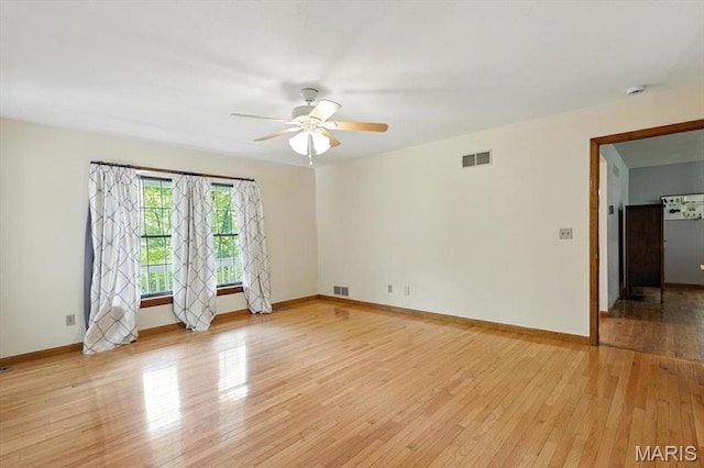 18232 Prickly Pear Ct, Pacific, MO 63069 - unfurnished room with light wood finished floors, ceiling fan, and a smoke detector